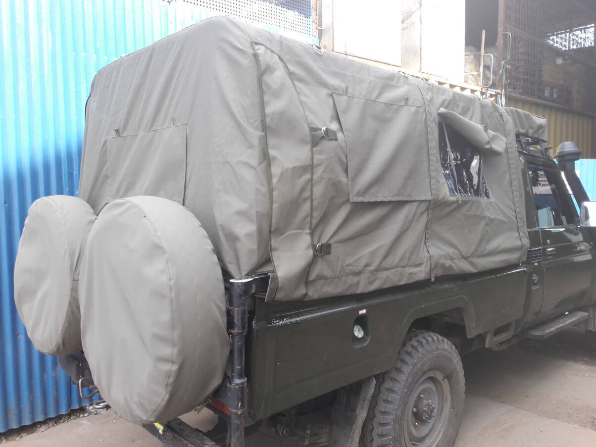 Canvas on rear wheel and roof Canvas on rear wheel and roof